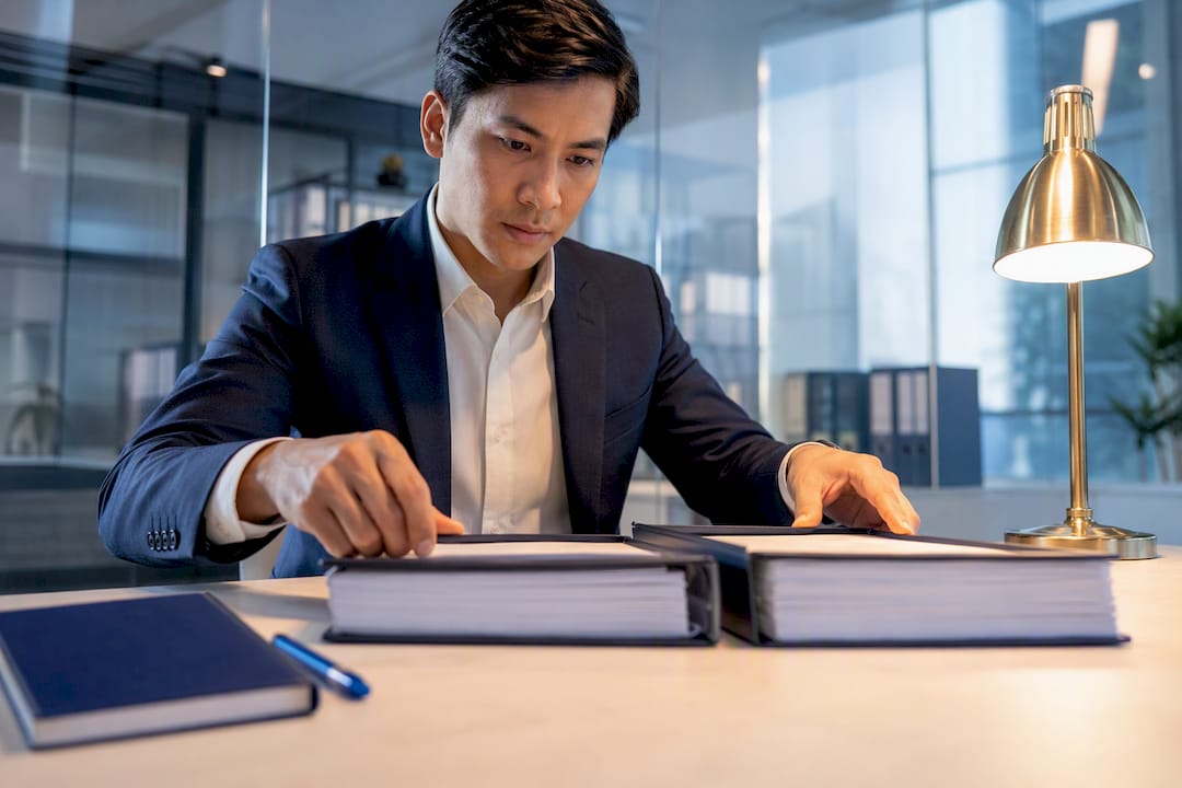 Legal translator reviewing certified documents