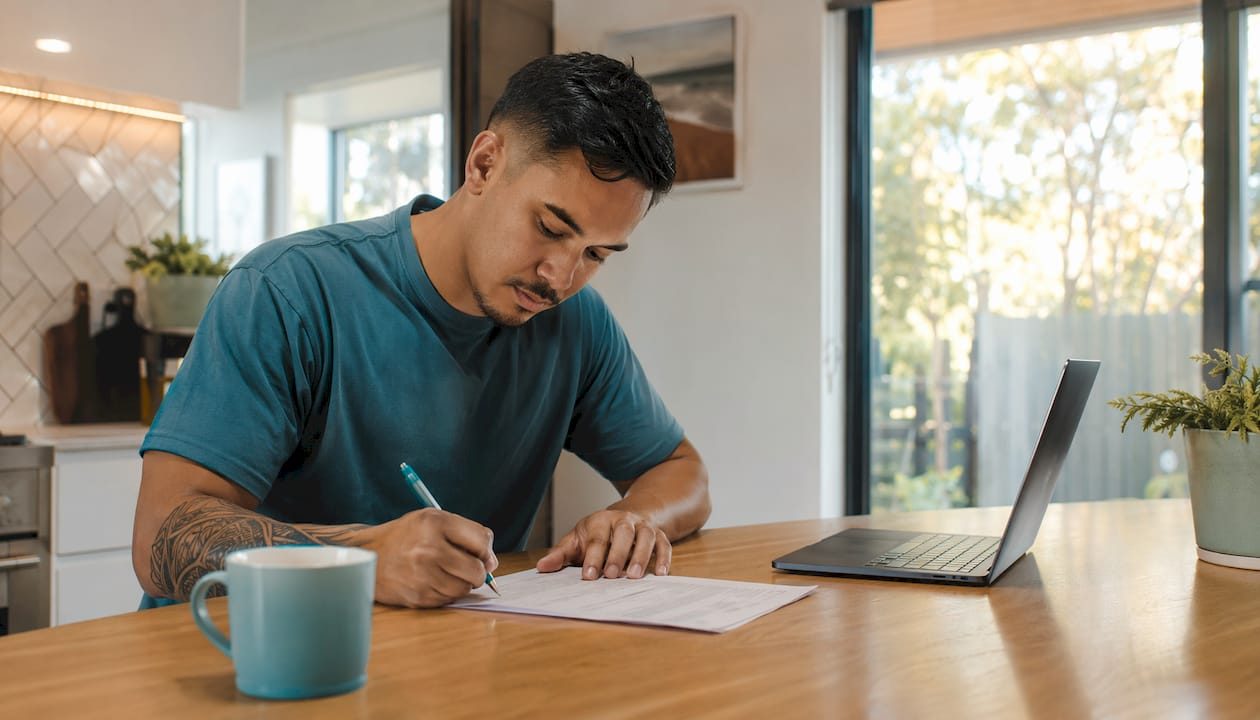 Hands reviewing fixed and floating mortgage papers