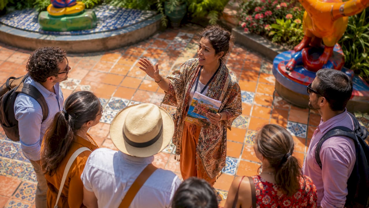 Museum tour guide engaging storytelling to visitors