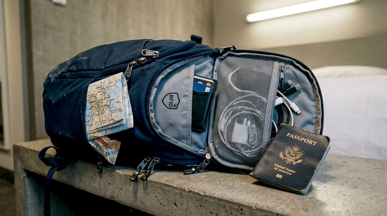 Open anti-theft backpack showing security details