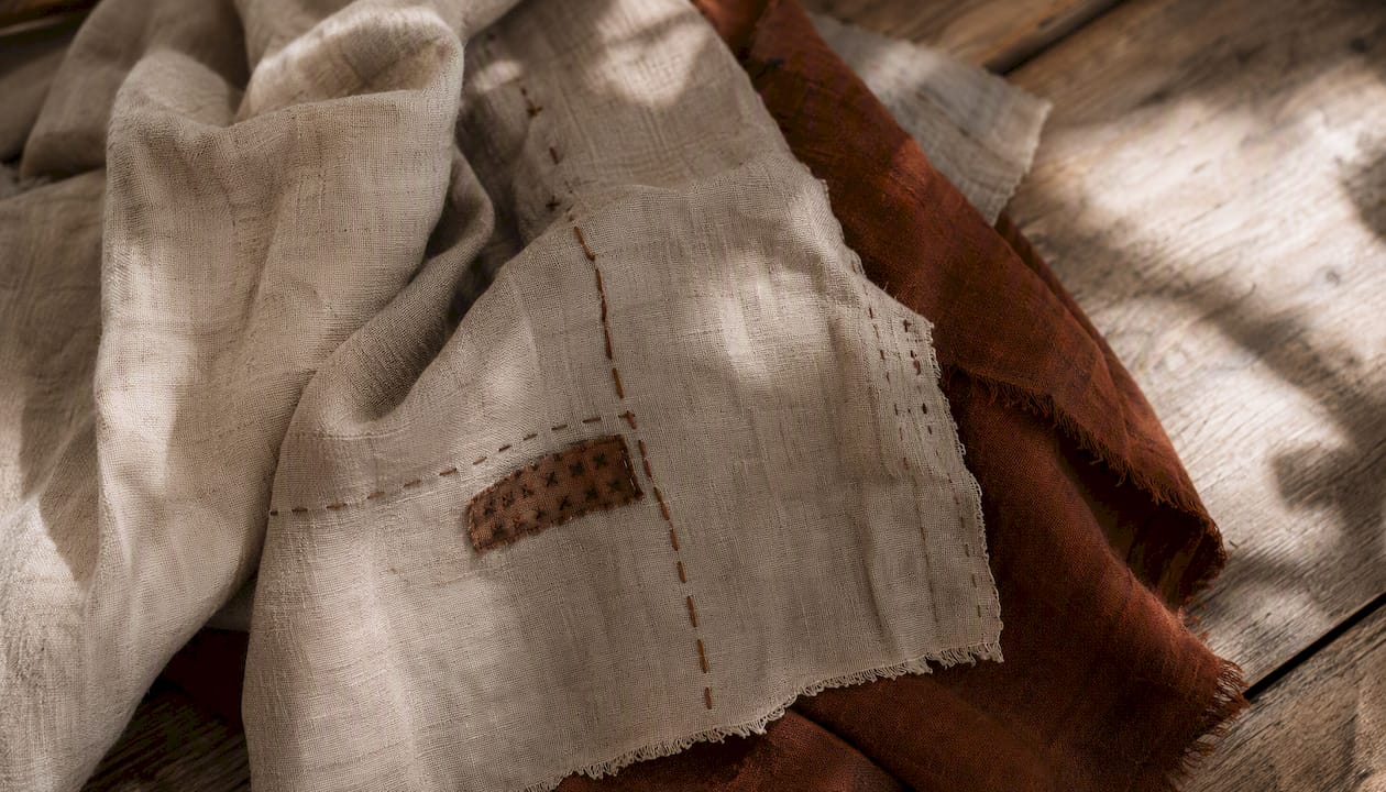 Close-up of upcycled embroidered cotton fabric