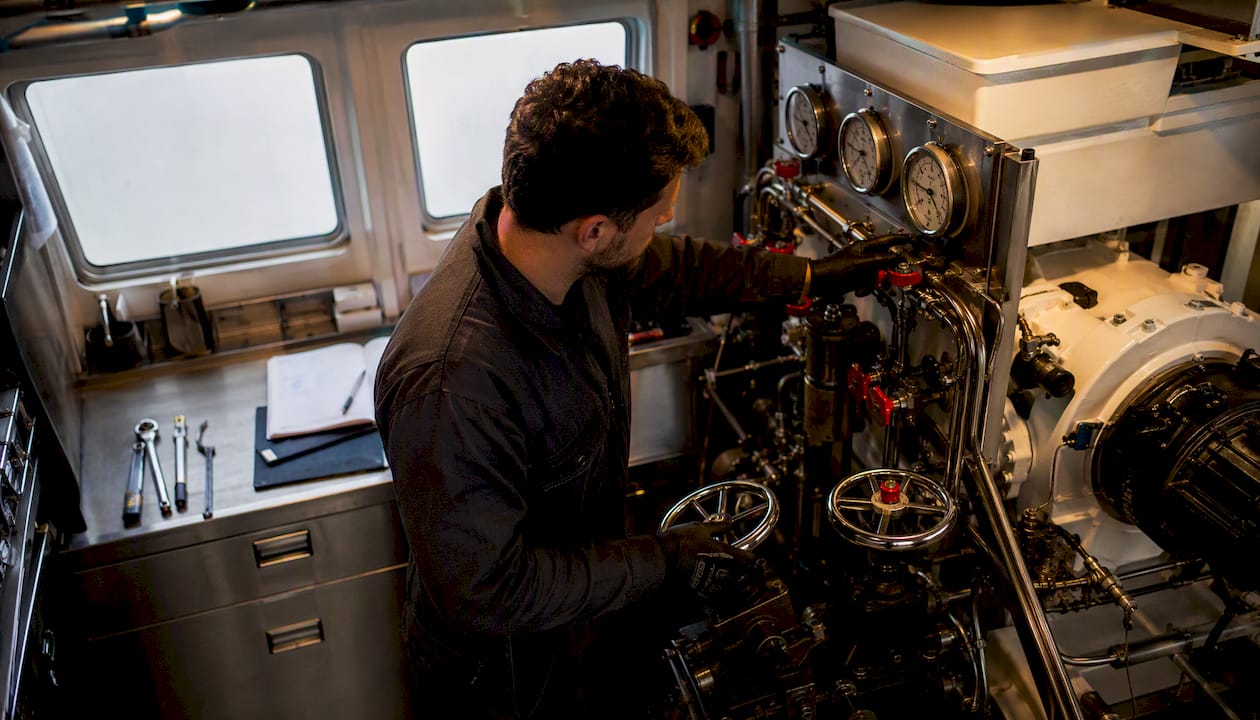 Marine engineer checking yacht technical systems