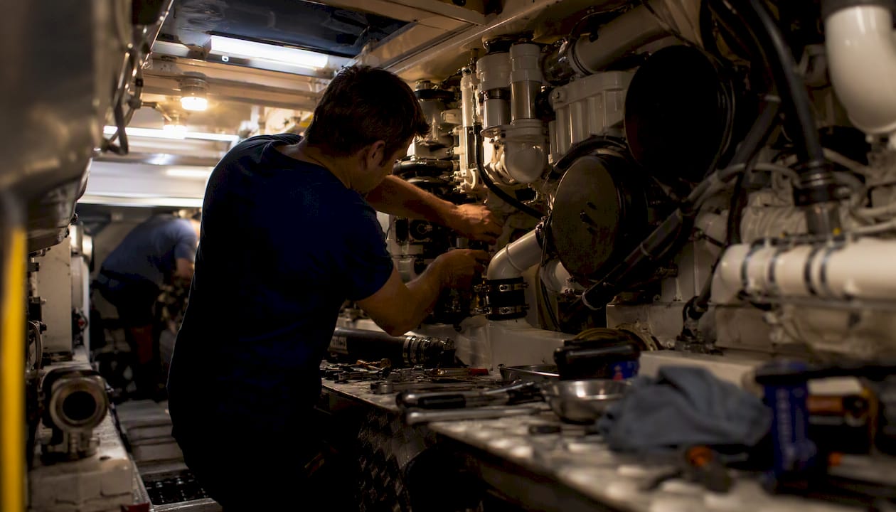 Engine refit underway in sport fishing yacht