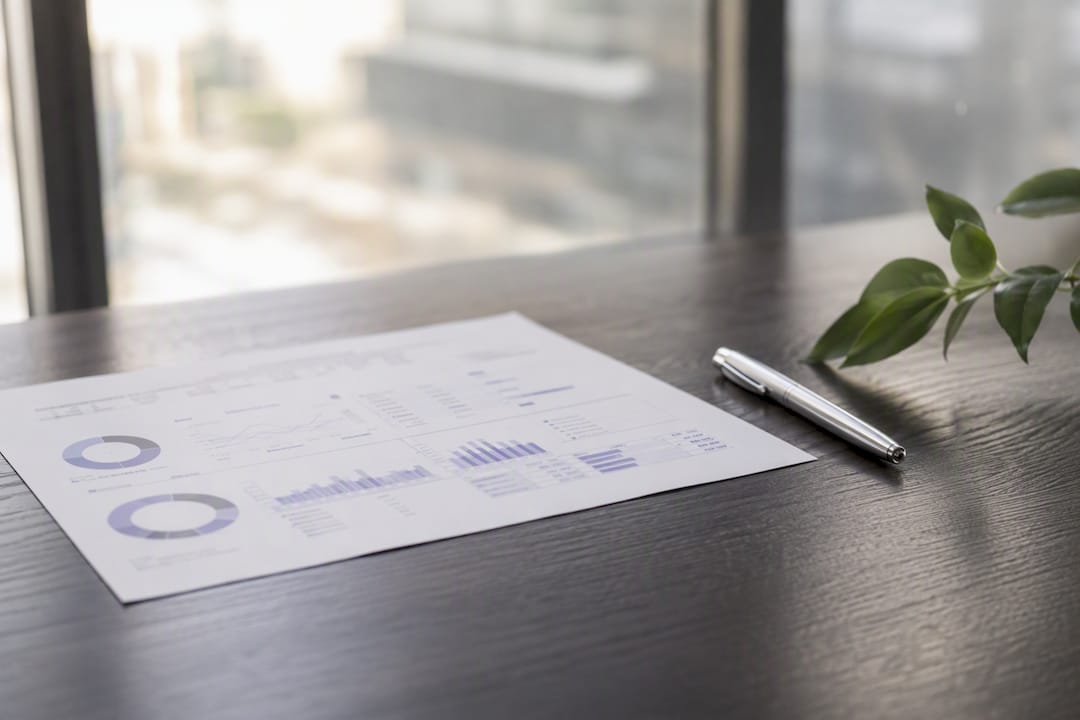Real estate dashboard printout on luxury desk