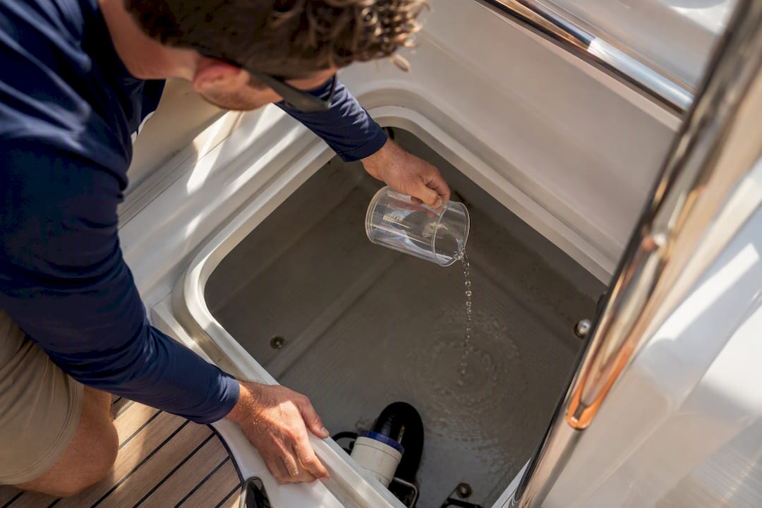Technician testing a yacht bilge pump