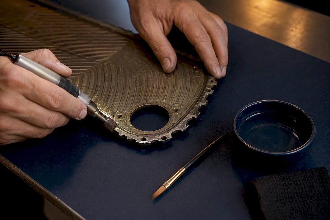 Heat exchanger plate being reconditioned