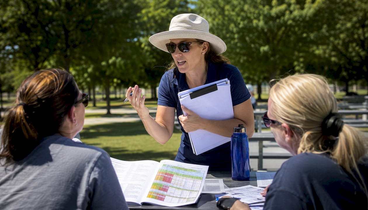 Tournament director reviewing match schedules