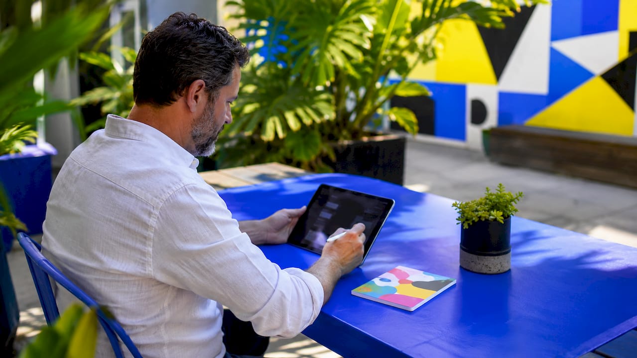 Engineer interacting with tablet UI components
