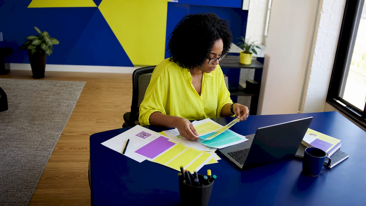 UX designer reviewing usability notes