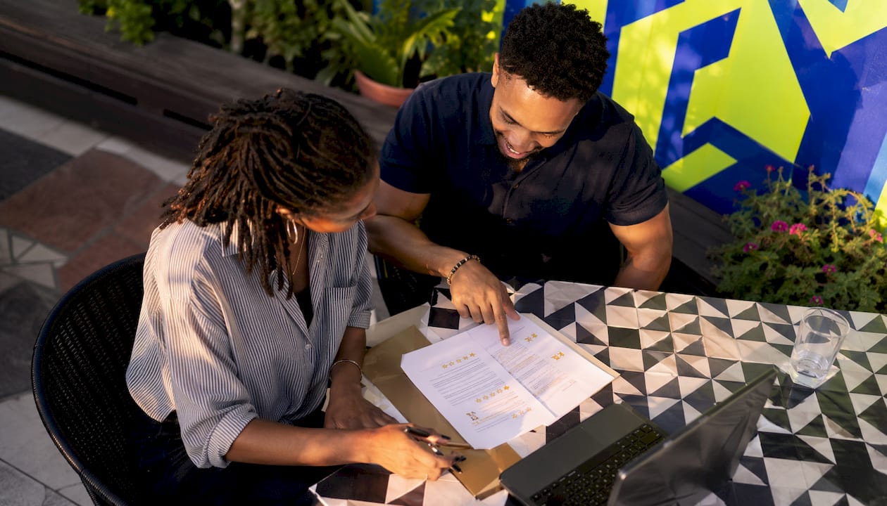 Entrepreneurs reviewing customer feedback