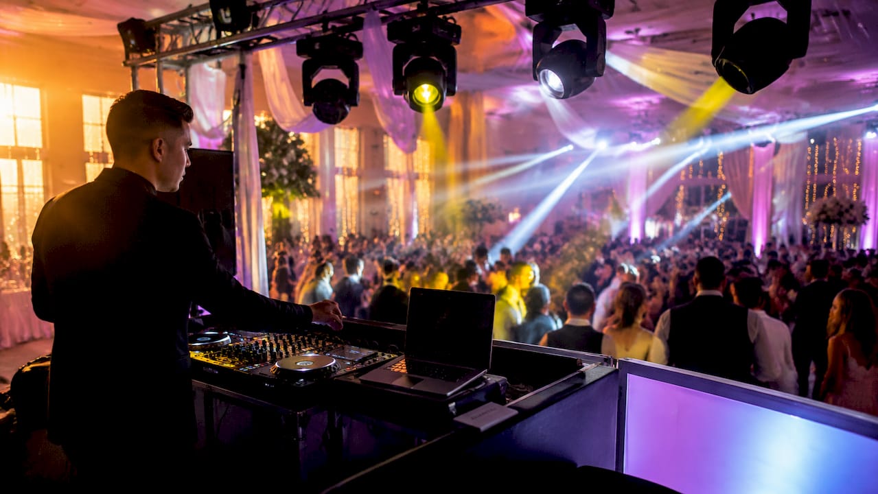 Intelligent moving head lights over wedding dance floor