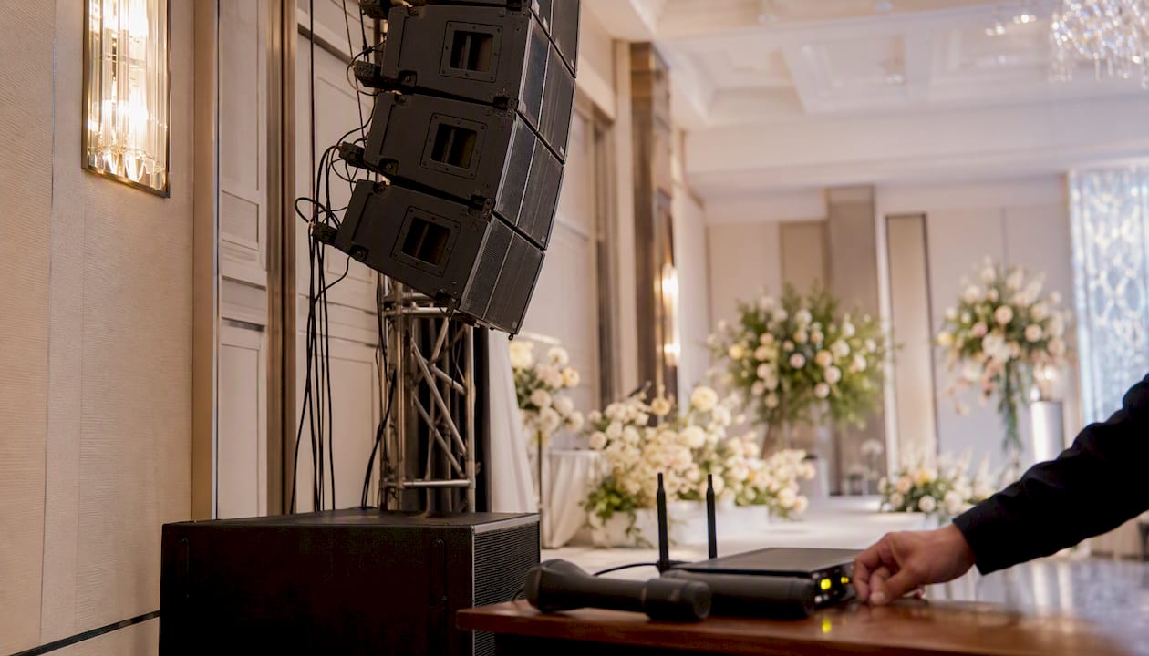 Professional line array speakers at wedding venue