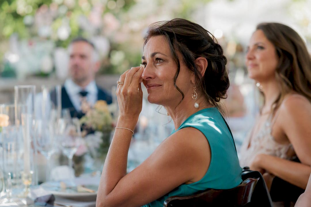 Emotional wedding guest during speech