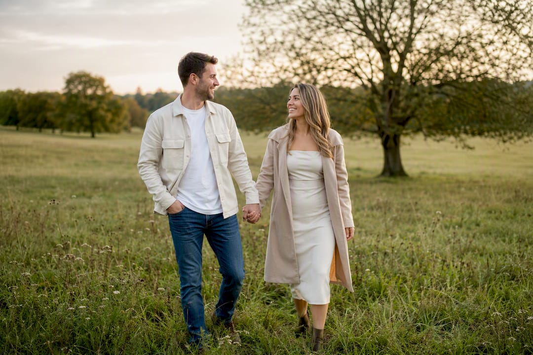 Couple changing outfits at golden hour outdoors