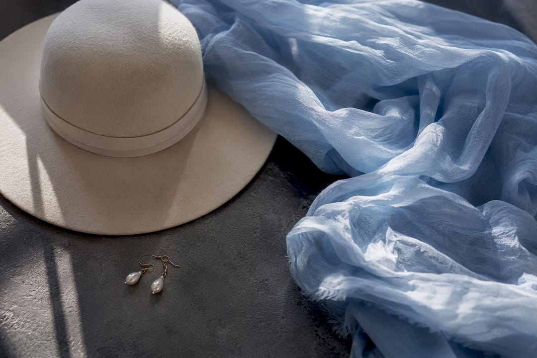 Engagement shoot accessories on wooden table