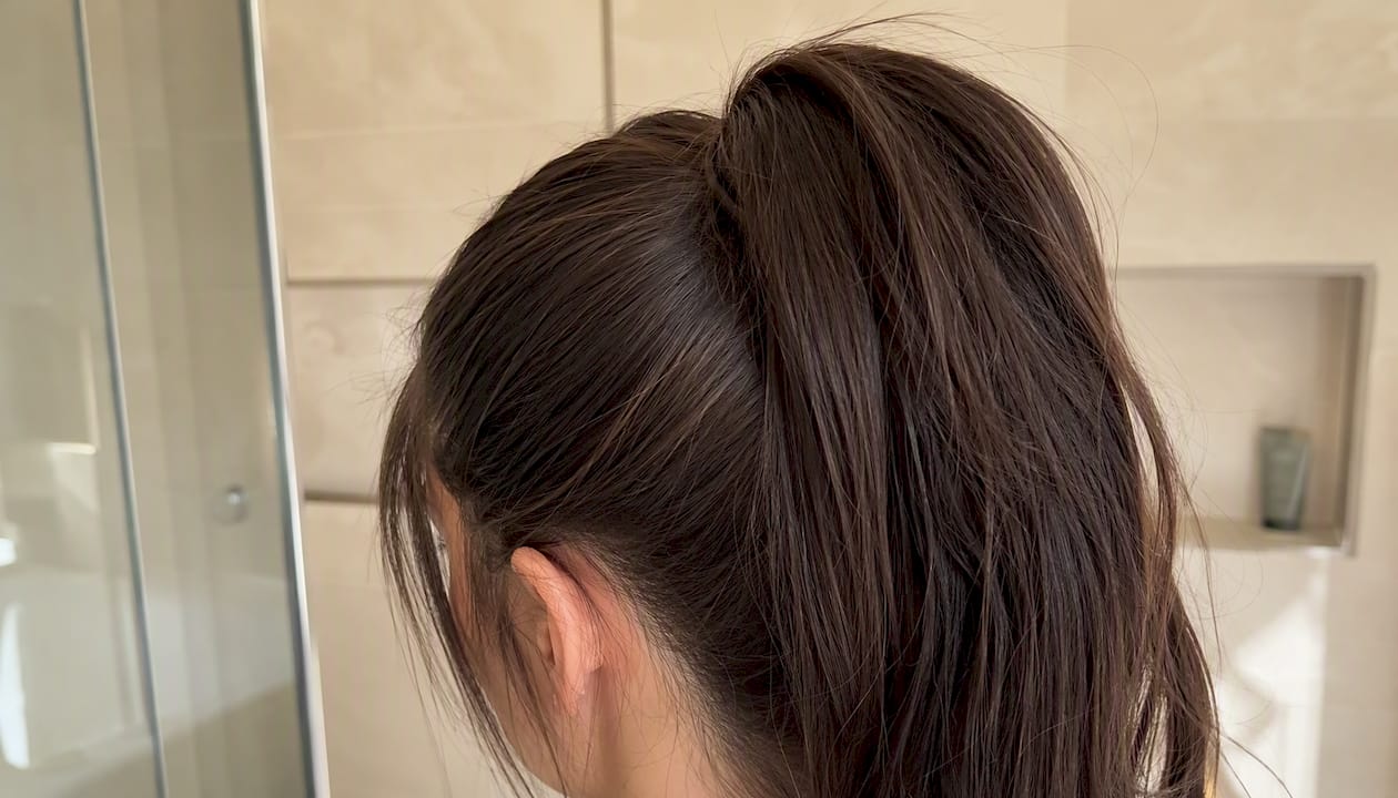 Close-up of blended clip-in ponytail extension base