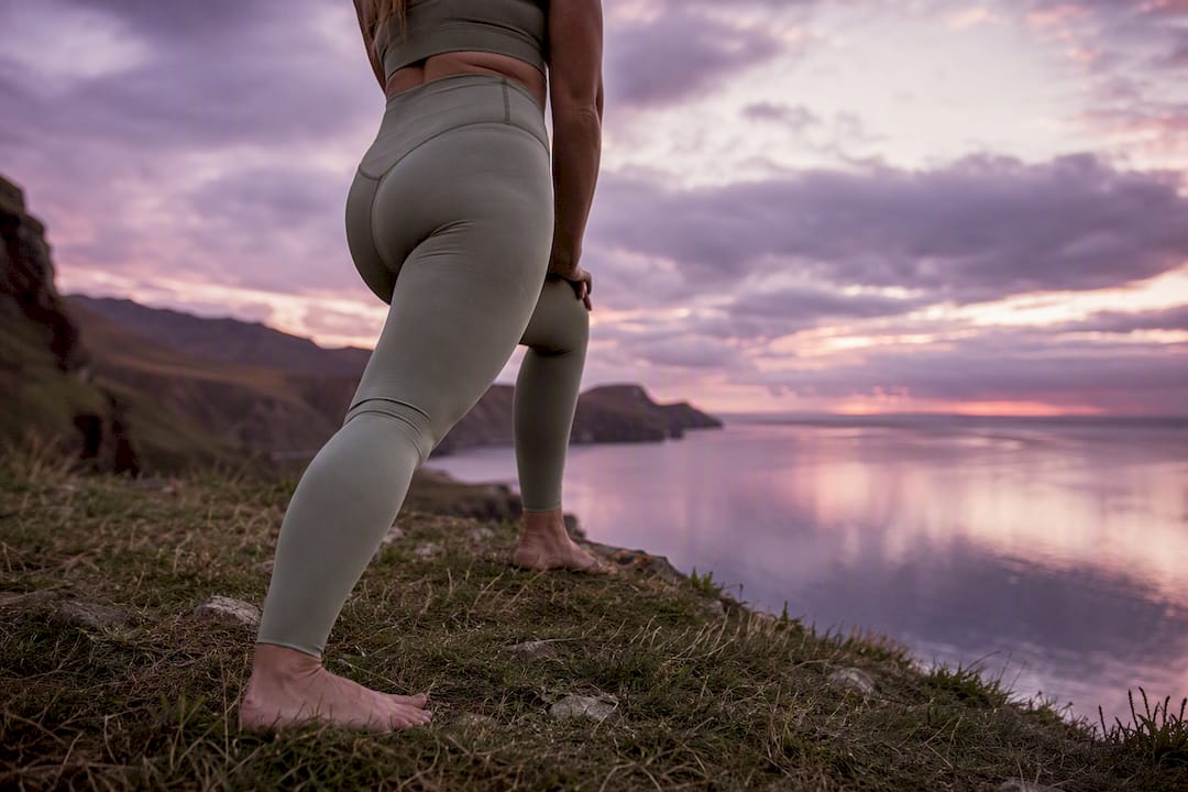 Athlete stretching calf muscles after workout