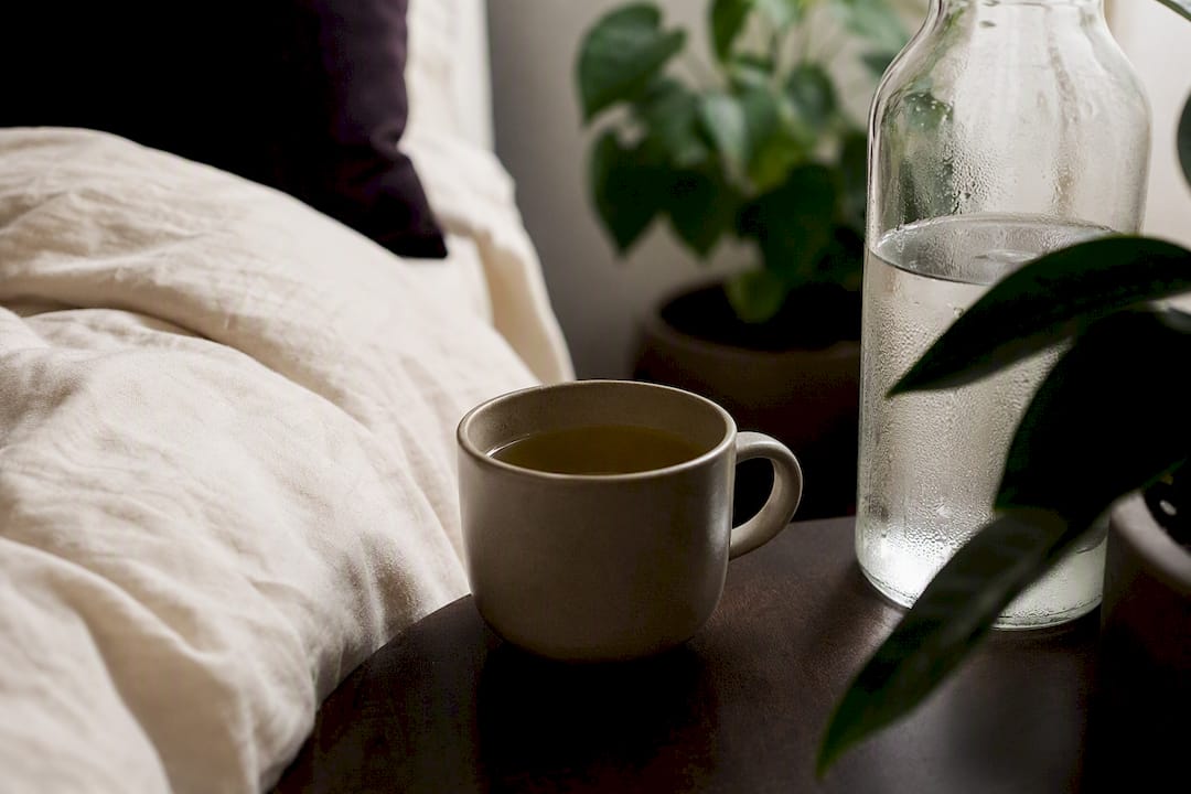 Hydrating beverages and wellness bathroom setup