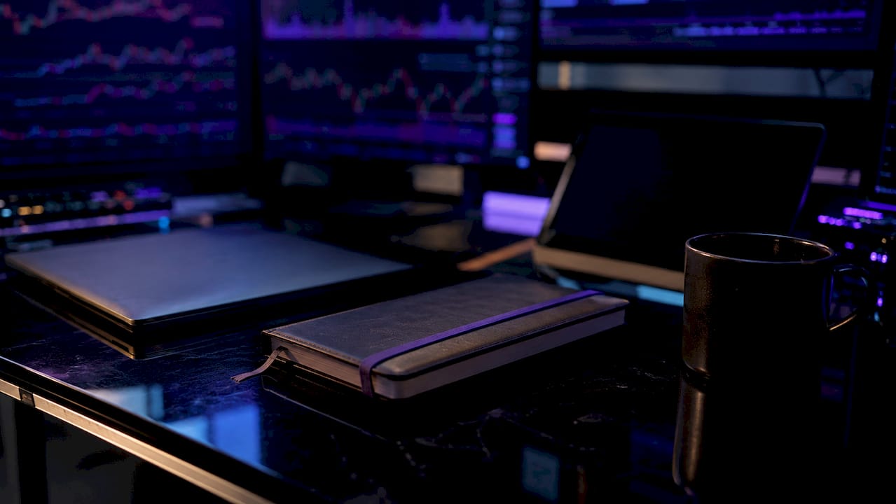 Hands resting calmly, symbolizing controlled investing