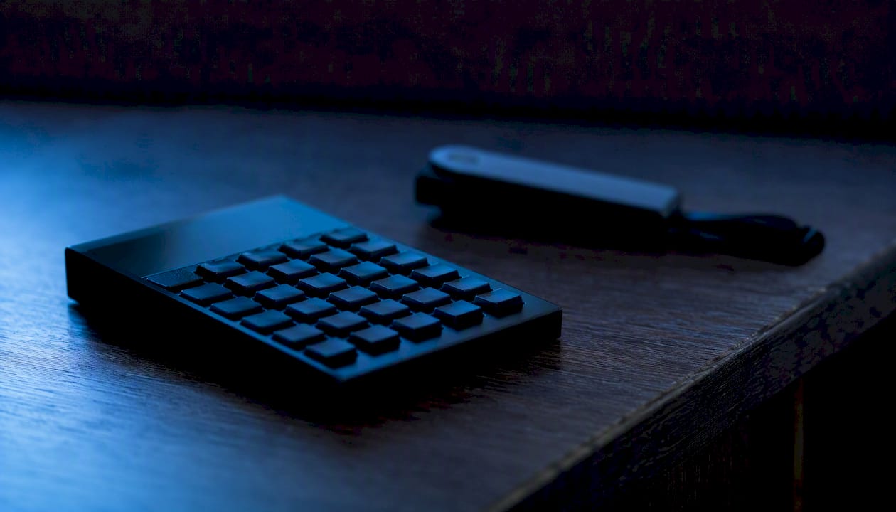 Calculator and crypto wallet detail on desk