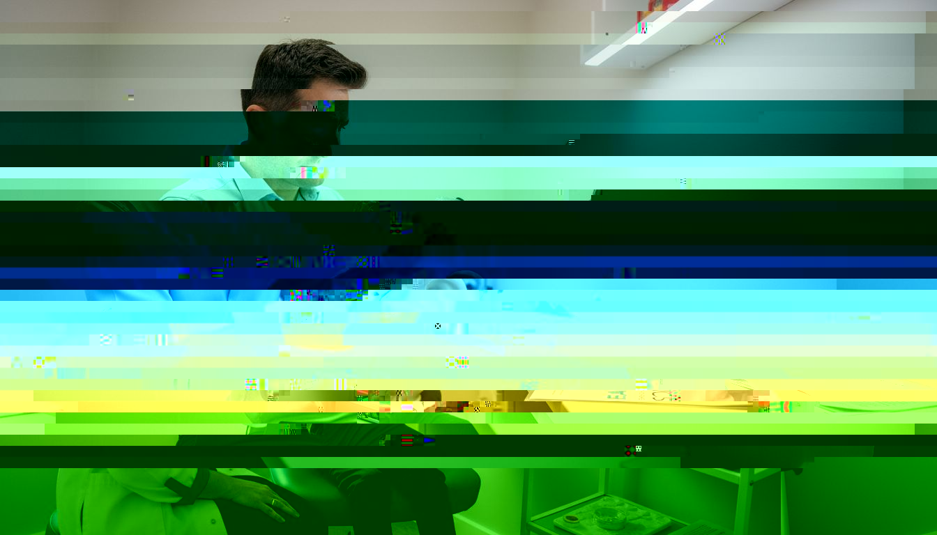 Aural care specialist prepares ear exam tools