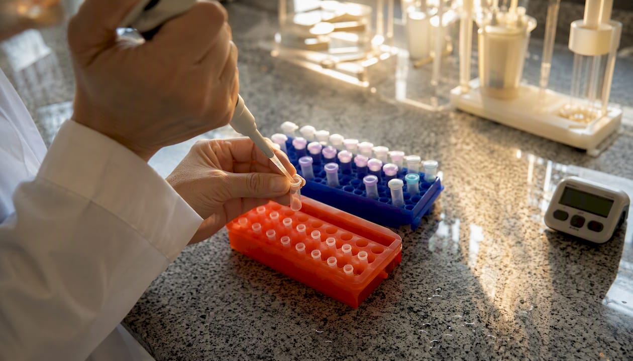 Trainer demonstrating accurate pipetting technique