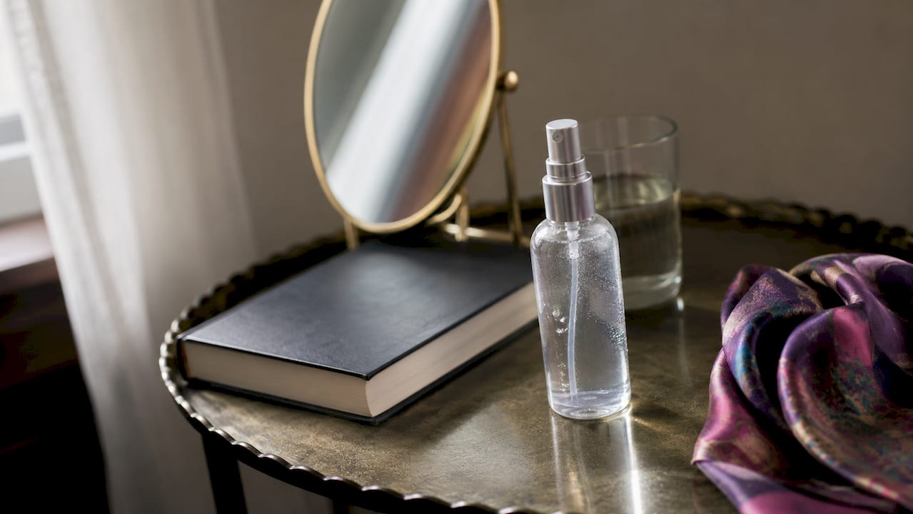 Close-up of throat spray bottle on table