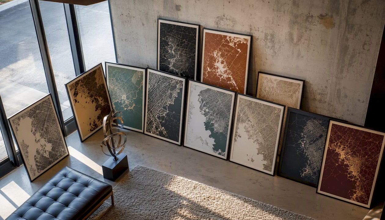 Assorted style map posters in living room corner