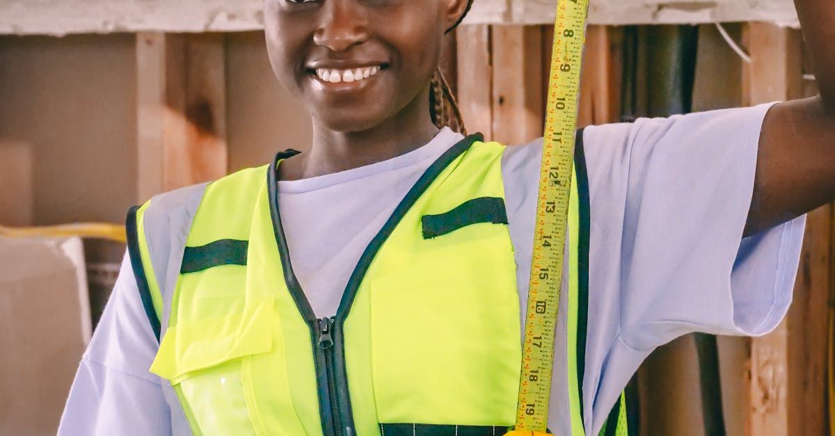 Engineer uses camera to measure building displacement after disaster