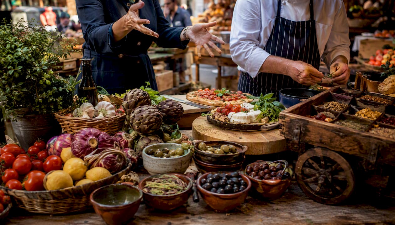 Food tasting and cooking demo at Roman market