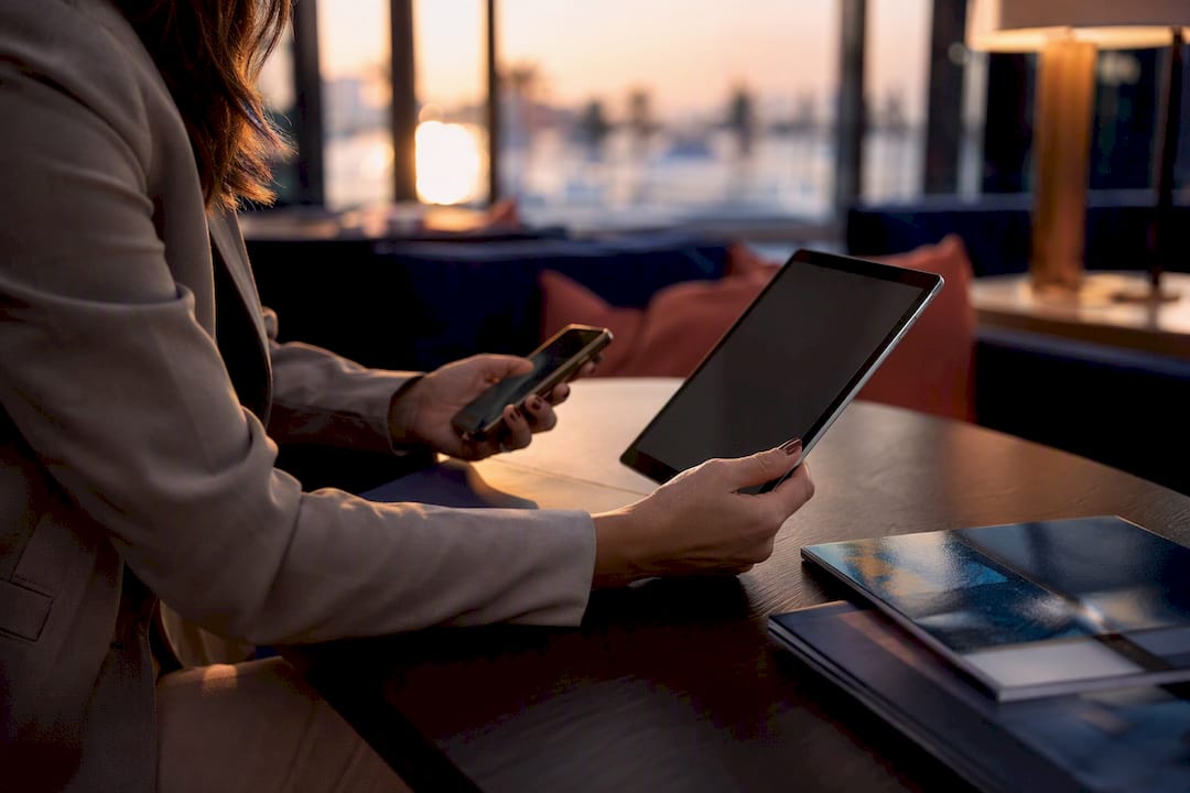Travel agent coordinating private boat booking
