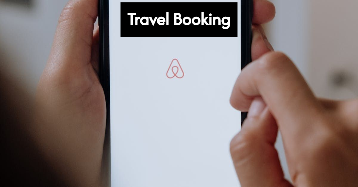 Traveler booking a trip online with devices