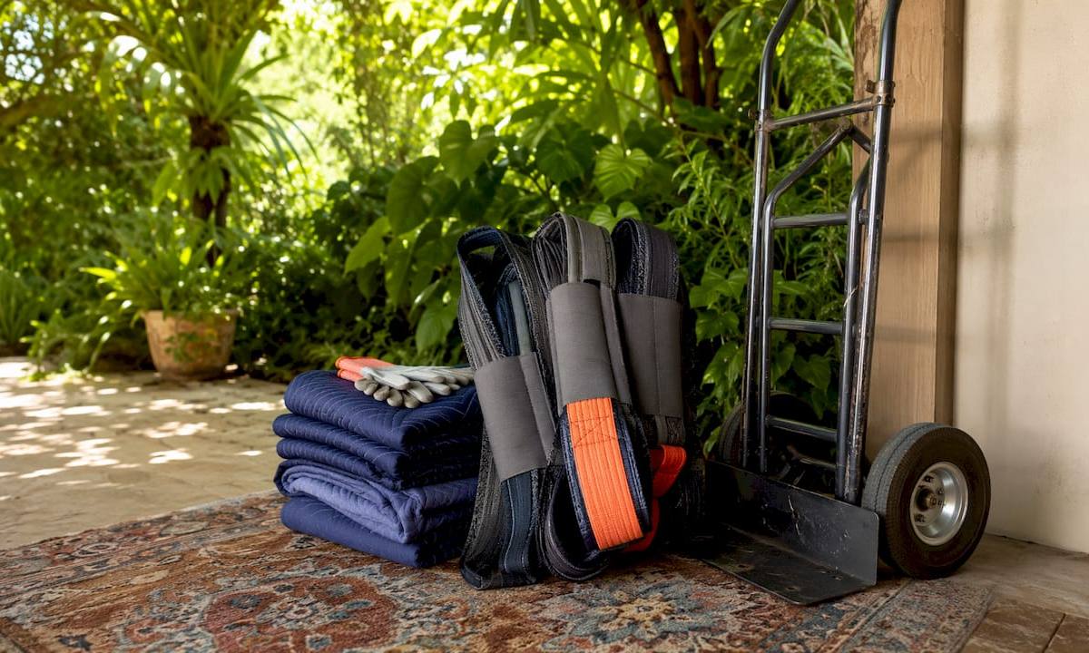 Gun safe moving equipment neatly arranged outdoors