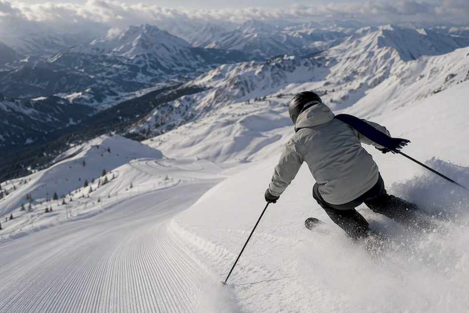 Skier turning through February alpine powder