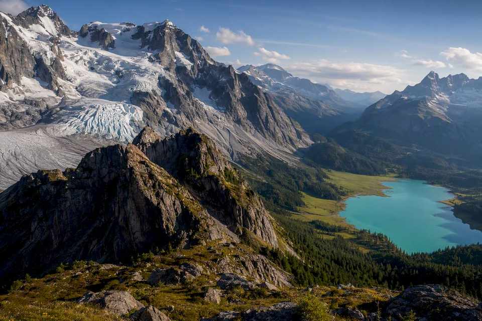 Glacier and turquoise Rocky Mountain lake