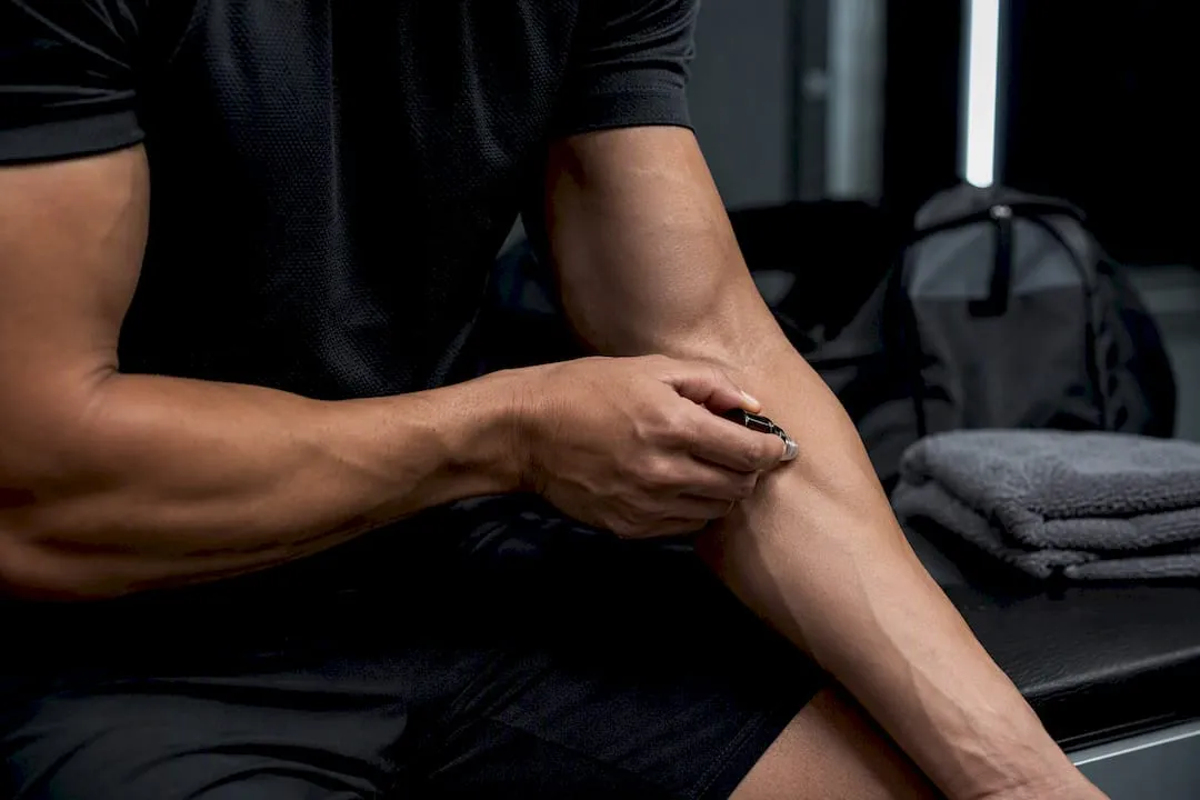Athlete applying fragrance to inner elbow