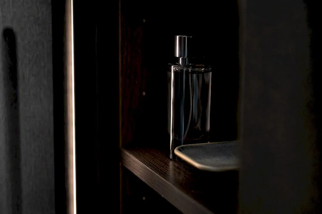 Anonymous fragrance bottle stored in darkness